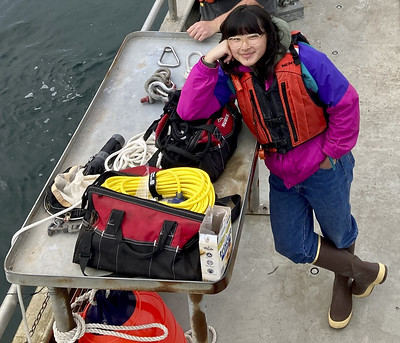 Summer Scholar Alex Ang on a research vessel