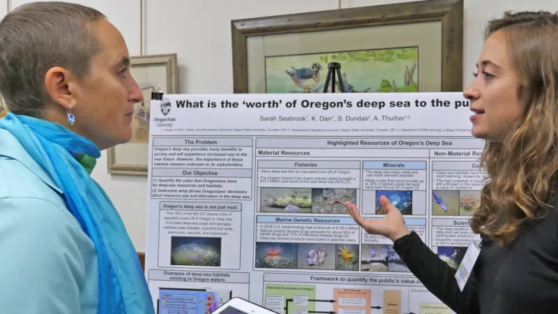 Sarah Seabrook talks to Leigh Torres at a conference