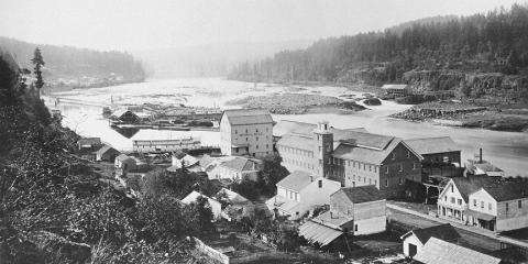 A photo of the homes and mill on the Willamette Falls in 1867.